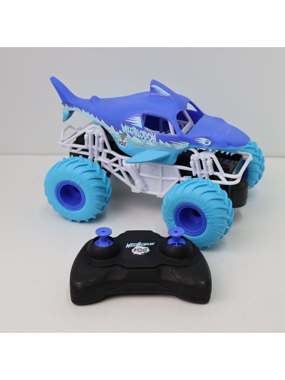 Spin Master Remote Control Blue Shark Monster Truck Toy with Light Blue Tires